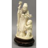 A GOOD QUALITY 19TH/20TH CENTURY CHINESE IVORY GROUP, together with a wire inlaid fitted wood stand,