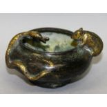 A SMALL 20TH CENTURY ORIENTAL GILDED BRONZE BOWL, the rim cast with a rat and with a sinuous