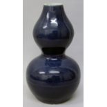 A CHINESE BLUE GLAZED DOUBLE GOURD PORCELAIN VASE, the base with a six-character Wanli mark, 8.