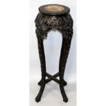 A SIMILAR 19TH CENTURY TALL CHINESE CIRCULAR MARBLE TOP CARVED HARDWOOD STAND, with pierced