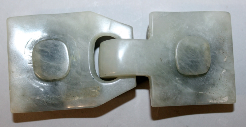 A CHINESE TWO-SECTION CELADON JADE-LIKE BELT BUCKLE, decorated in relief with chilong, 4.5in wide - Image 6 of 8