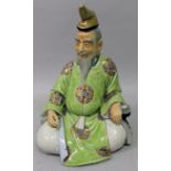 A GOOD QUALITY JAPANESE ENAMELLED PORCELAIN FIGURE, circa 1900, the bearded scholar seated with