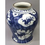 A LARGE CHINESE MING STYLE BLUE & WHITE PORCELAIN VASE, the sides decorated with shaped panels of