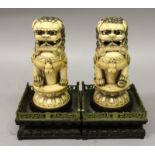 A PAIR OF GOOD QUALITY EARLY 20TH CENTURY CHINESE CARVED IVORY MODELS OF BUDDHISTIC LIONS,