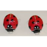 A pair of sterling silver and enamel cufflinks in the form of ladybirds.