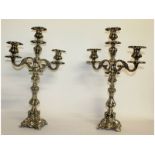 A very good pair of Russian silver two branch candelabra with scrolling branches. 20ins high.