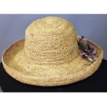 A hat worn straw hat.