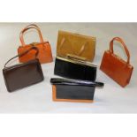 Six various patent leather and other ladies handbags.