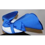 A Mitzi Lorenz Model of London blue polka dot hat.