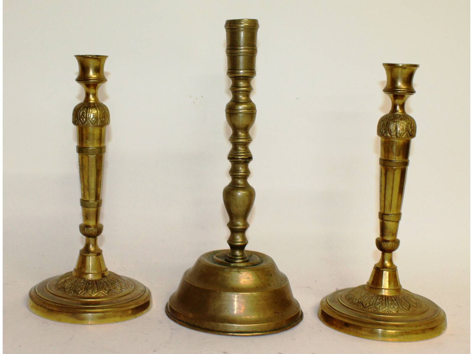 A good pair of 18th-19th century French ormolu circular candlesticks, 10.5ins high, and a large