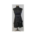 A Karen Miller black dress, size 16.