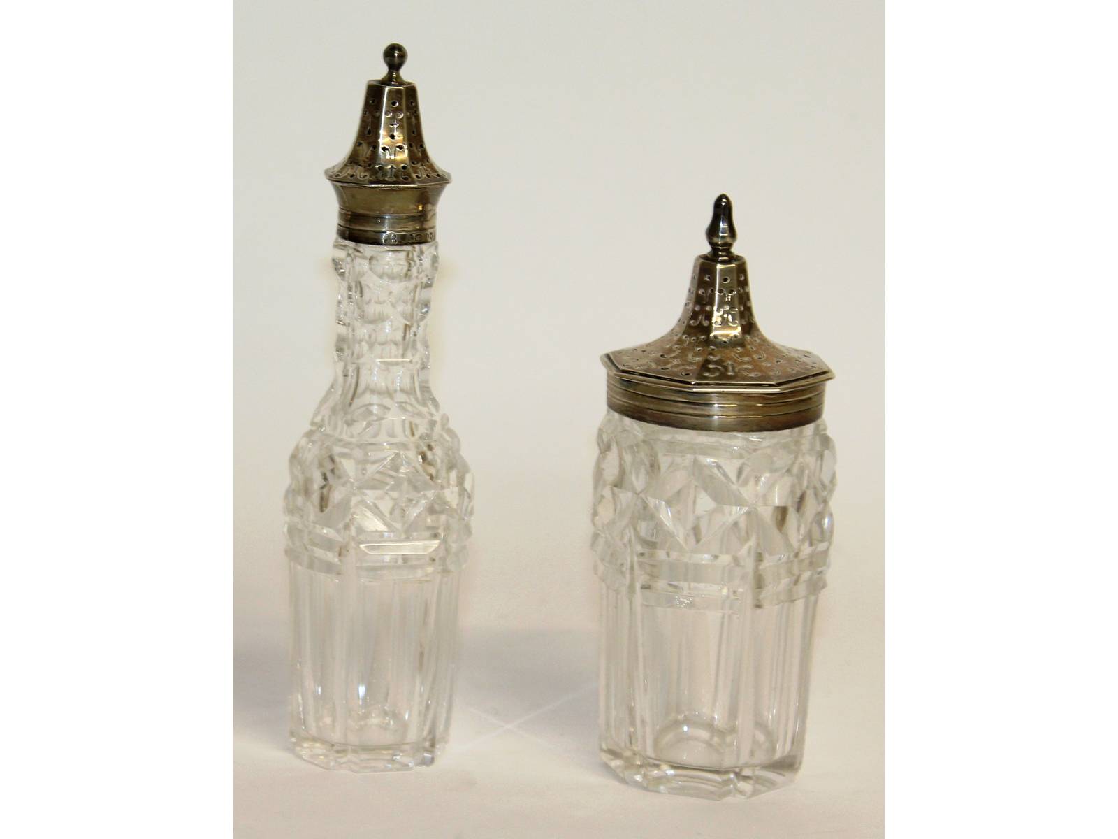 A Victorian silver top octagonal sugar sifter and pepperette. London 1847.