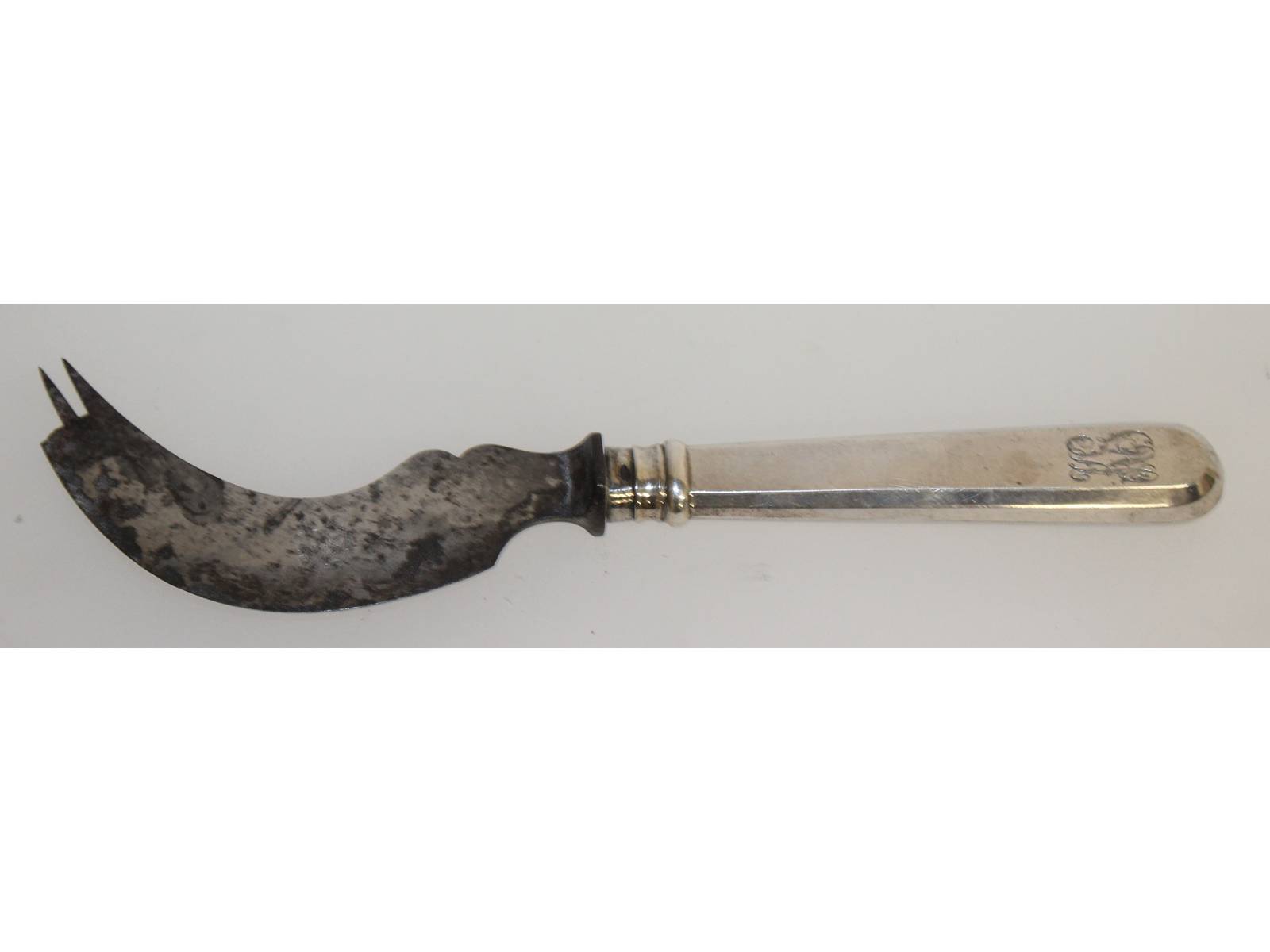 A Russian silver handled knife and fork combined, Moscow 1896-1908. 21cms long.