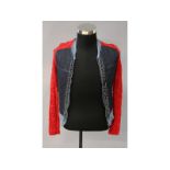 A zip up red and denim jacket top.