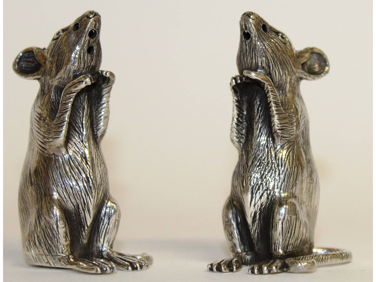 A pair of solid silver novelty mice. 5.5cms high.