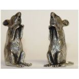 A pair of solid silver novelty mice. 5.5cms high.