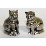 A pair of solid silver novelty cat salt and peppers. 6cms high.