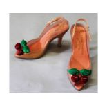 A pair of Vivienne Westwood "Melissa" shoes, size 37, each with two cherries.