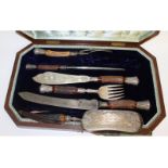 A Victorian horn handled six piece carving set, in a fitted case.