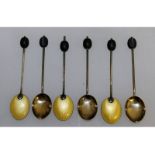 A good set of six enamel silver bean end spoons. Birmingham 1932.