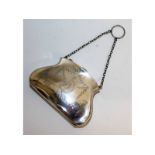 A silver evening purse with bright cut decoration. Chester 1911.