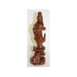 A good Chinese carved wood figure of Guanyin. 11ins high.