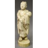 A FINE QUALITY SIGNED JAPANESE MEIJI PERIOD IVORY OKIMONO OF A STANDING GIRL, with upturned face and