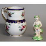 AN 18TH CENTURY CHELSEA DERBY MUG with ribbed neck painted with flowers under blue borders and a