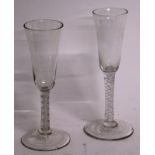 TWO WINE GLASSES with white opaque twist stems. 7ins high.
