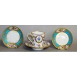 AN EARLY 19TH CENTURY PARIS PORCELAIN PAIR OF SAUCERS with portrait heads in panels with roses the