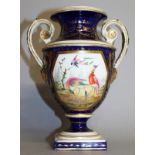AN EARLY 19TH CENTURY DERBY TWO HANDLED VASE painted with birds on a blue ground.