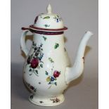AN 18TH CENTURY LIVERPOOL COFFEE POT AND COVER painted with colourful flowers.