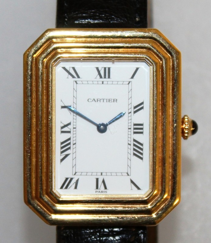 A SUPERB 18CT GOLD CARTIER WRISTWATCH, No. 780960580, with leather strap.