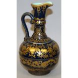 A CHINESE EUROPEAN FORM GILT DECORATED BLUE GLAZED PORCELAIN EWER, the sides with elaborate gilded