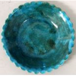 A SMALL CHINESE KANGXI PERIOD TURQUOISE GLAZED PORCELAIN DISH, the underside rim with a moulded