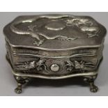 AN EARLY 20TH CENTURY CHINESE EXPORT SHAPED SILVER BOX, with hinged cover, the sides and cover