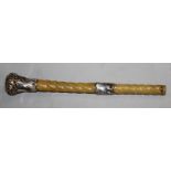 A FINE QUALITY 19TH CENTURY SILVER-METAL MOUNTED RHINOCEROS HORN CANE HANDLE, the spiral twist