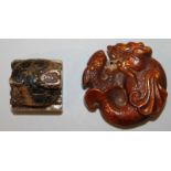 A SMALL CHINESE SOAPSTONE SEAL, of square section and surmounted by a tortoise, 1.25in square & also