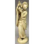 A SIGNED JAPANESE MEIJI PERIOD IVORY OKIMONO OF A BIJIN, standing on geta and holding aloft a