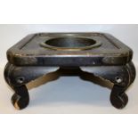 A JAPANESE MEIJI PERIOD LACQUERED WOOD STAND, incorporating a removable bronze bowl, the stand