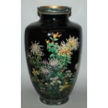 A LARGE FINE QUALITY JAPANESE MEIJI PERIOD HEXAGONAL SECTION CLOISONNE VASE, the sides decorated