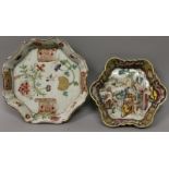 TWO 18TH CENTURY CHINESE FAMILLE ROSE PORCELAIN TEAPOT STANDS, one painted with foliage, the other