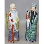 A PAIR OF EARLY 20TH CENTURY CHINESE FAMILLE ROSE PORCELAIN IMMORTALS, depicting the Fu and Shou