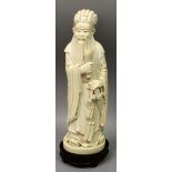 A LARGE GOOD QUALITY 19TH/20TH CENTURY CHINESE CARVED IVORY FIGURE OF A SAGE, weighing 1.73Kg,