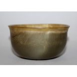 A SMALL CHINESE HORN BOWL, the veined material semi-transparent, the interior with an onlaid English