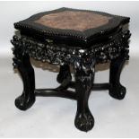 ANOTHER 19TH CENTURY CHINESE MARBLE INSET HARDWOOD STAND, of serpentine square form with pierced and