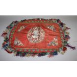 A GOOD 19TH CENTURY CHINESE RED GROUND SILK KESI PANEL, decorated to its centre with a crane