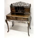 A 19TH CENTURY CHINESE HARDWOOD DESK, with pierced cresting rail, two small drawers, a small