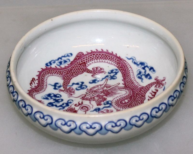 A GOOD 18THCENTURY CHINESE QIANLONG MARK & PERIOD PUCE & BLUE ENAMELLED PORCELAIN BOWL, the interior