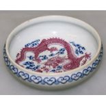 A GOOD 18THCENTURY CHINESE QIANLONG MARK & PERIOD PUCE & BLUE ENAMELLED PORCELAIN BOWL, the interior